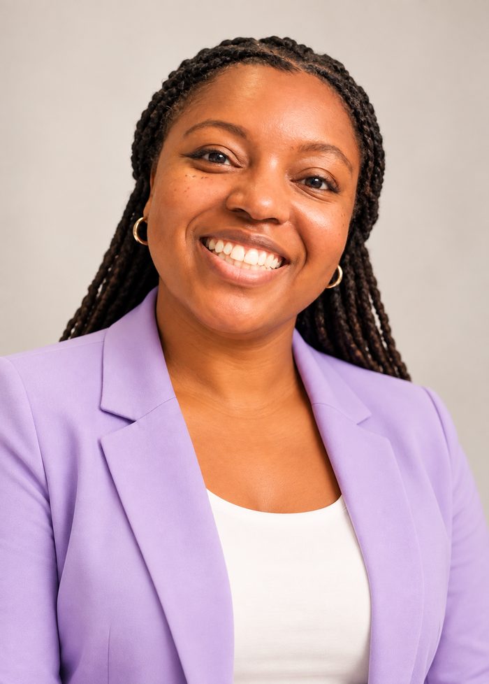 Dr. Tamara Starling, licensed psychologist in Texas, smiling in a lavender blazer